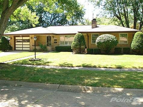 Make this all brick home on double lot your new home.