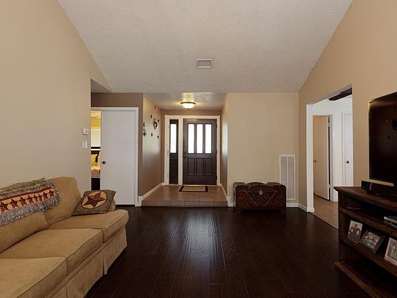 Gorgeous laminate wood floors throughout home.