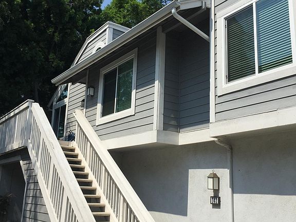 Stairs to front door and patio