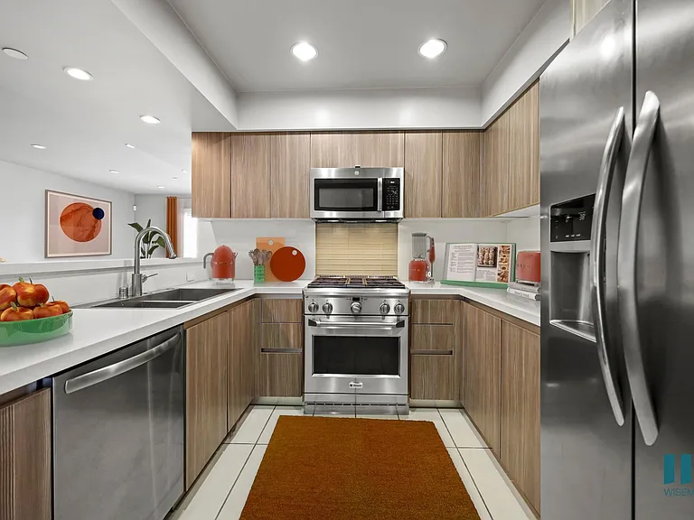 Large-Size Kitchen with Stainless-Steel Appliances and Ample Cabinet Storage