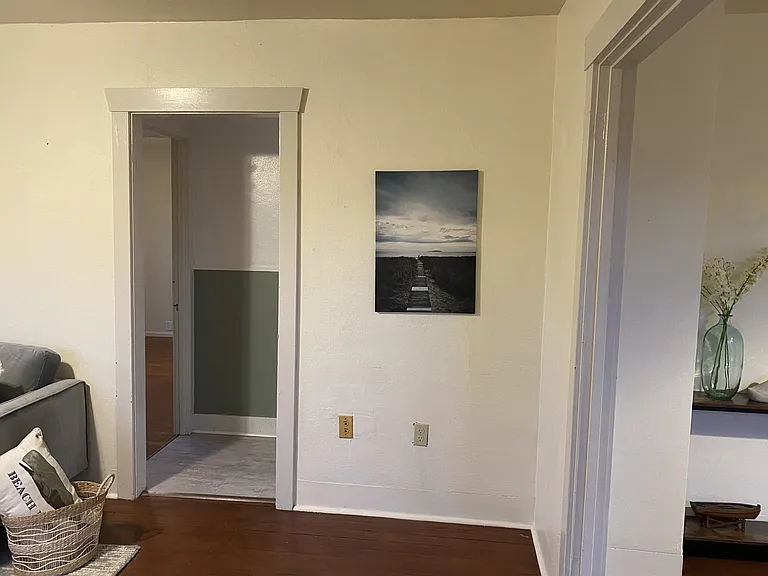 (home is not furnished) living room & threshold to dining room