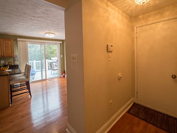 Garage entrance and kitchen and deck view