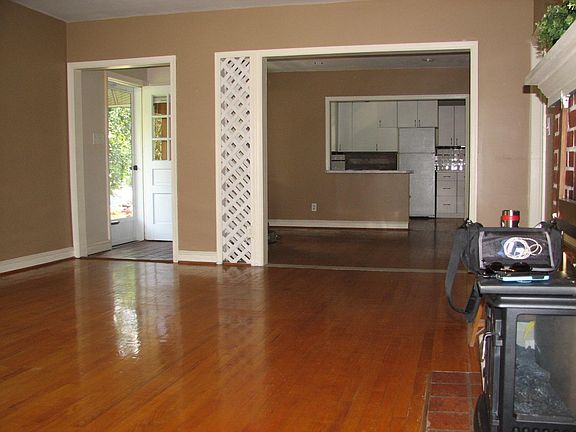 Living room looking into dining room and kitchen.