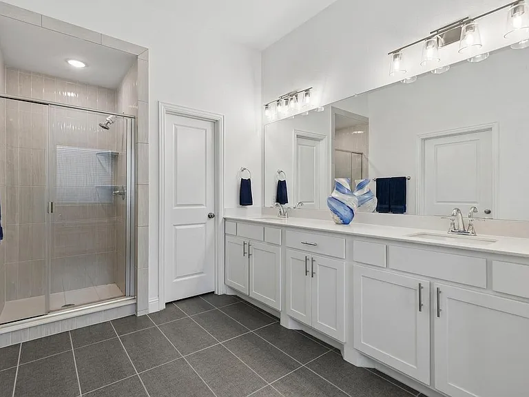 Large dual vanity for plenty of personal space for both, plus an oversized shower!
