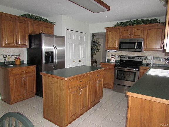 Kitchen-Great Kitchen offers more than enough counter space and is open to the family room!