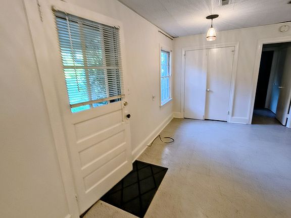 Living room with double closet.