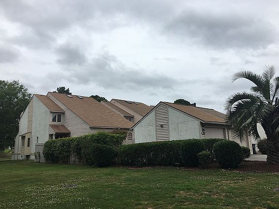 Side with open grass area