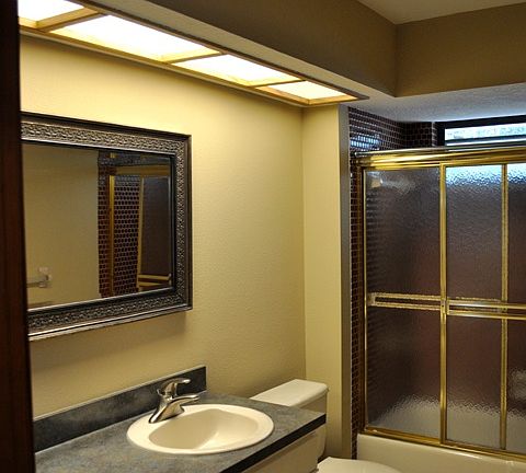Pool bath and linen closet.