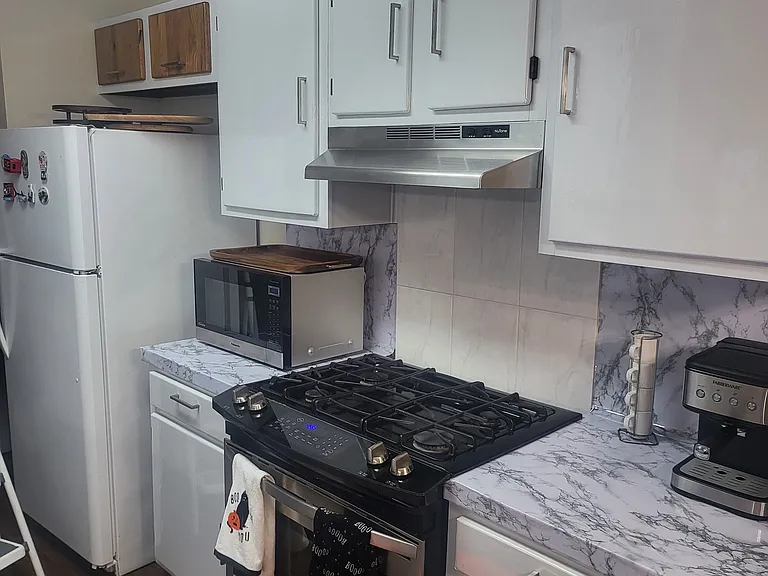 Kitchen with wood cabinets