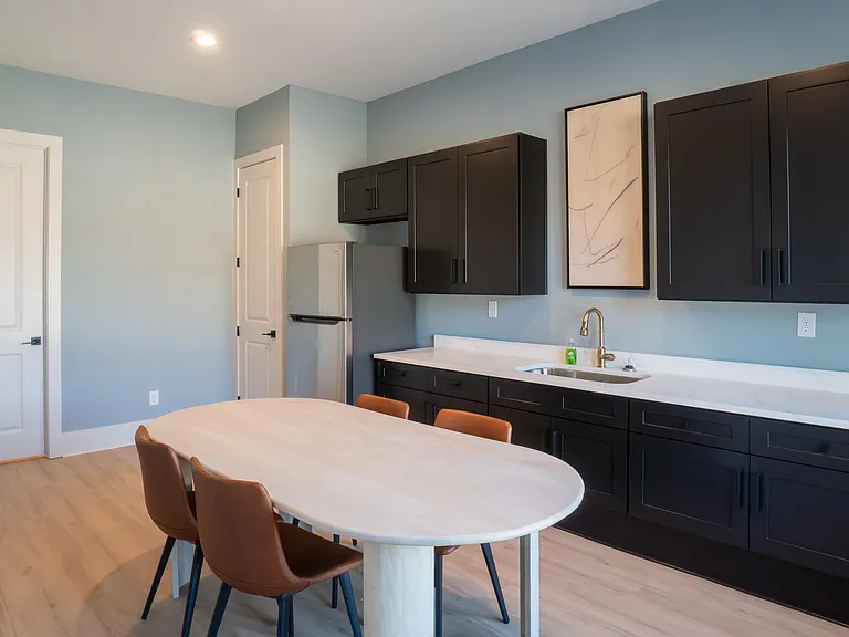 Kitchenette inside the clubhouse with seating
