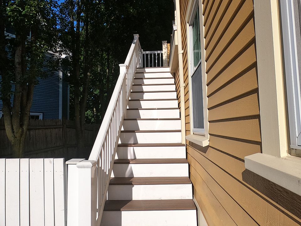 Entry on side of house. Leads up to back deck.