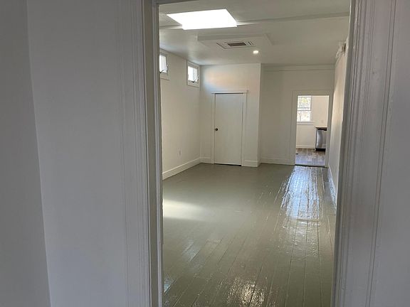 Center - Living Room looking toward Kitchen