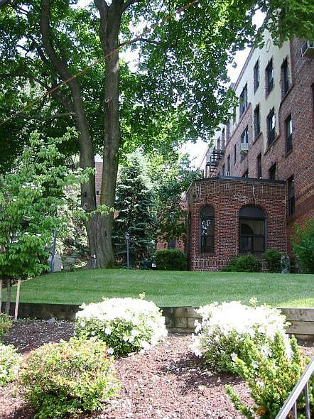 Gardens in front of building