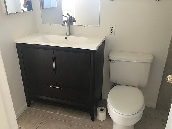 Upstairs bathroom has shower/tub and new vanity