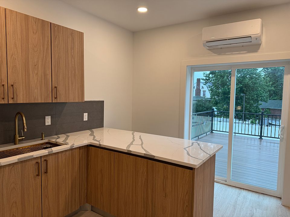 Kitchen with Door to Roof Deck