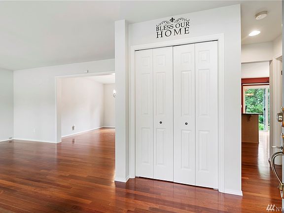 Entrance - Living room to the left, stairway to the right