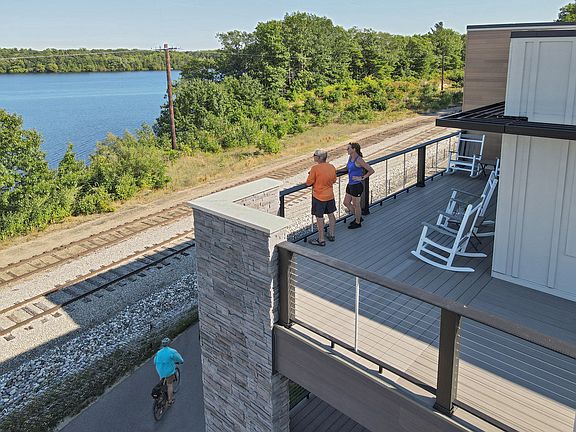 Wrap around deck with sweeping views of Boardman Lake