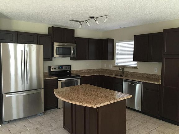 5th image of 10919 Morgan Horse Dr E