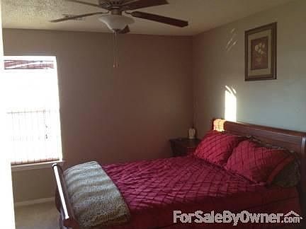 Master Bedroom : spacious bedroom; celing fan; walk-in closet; master bath
