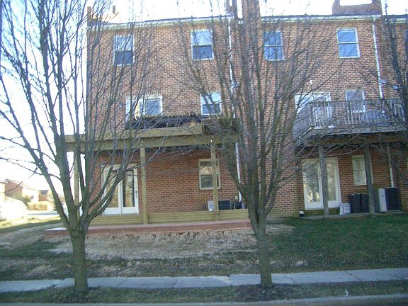 Rear of House (Deck and Rear Door into First Floor)