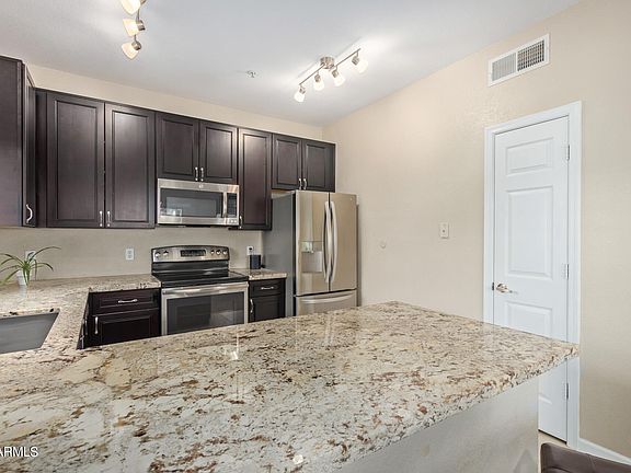 3rd image of 7401 W Arrowhead Clubhouse Drive #2058