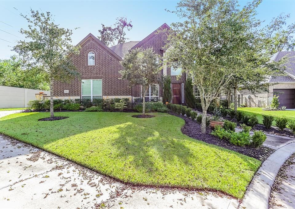 Well manicured landscaping with mature trees.  Beautiful curb appeal for a great home.