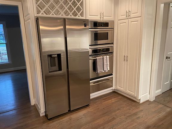 Kitchen with Stainless Steel Appliances convection microwave and warming drawer. Also built-in wine rack