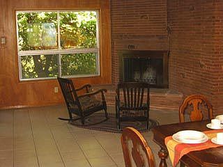 The balance of the dining room, complete with its own wood burning fireplace.