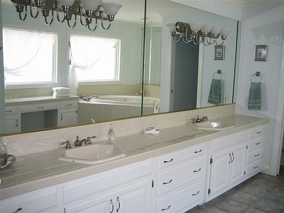The masterbath has all new fixtures, beautiful tile floor, double vanities, wh