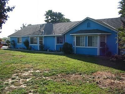 THREE CAR GARAGE, Built in 1994, on a Slab Foundation