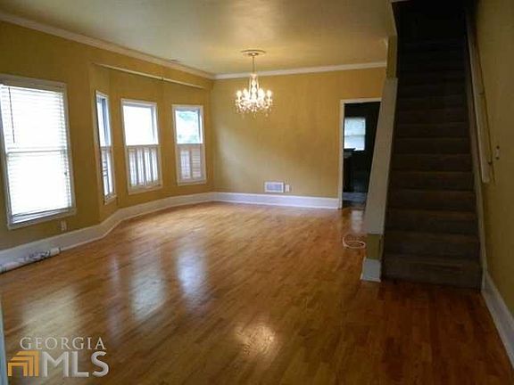 Large great room with beautiful hardwood floors