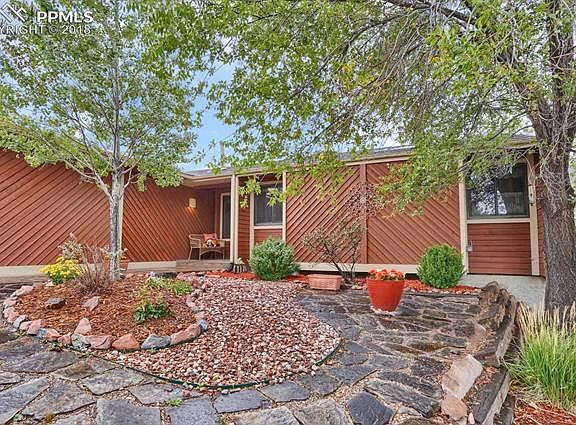 Welcoming front entry with little porch