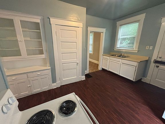 Kitchen features a large pantry and built in China Cabinet that would be perfect for your coffee bar.