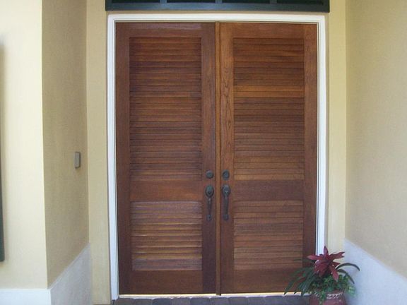 Double Mahogany front doors into courtyard