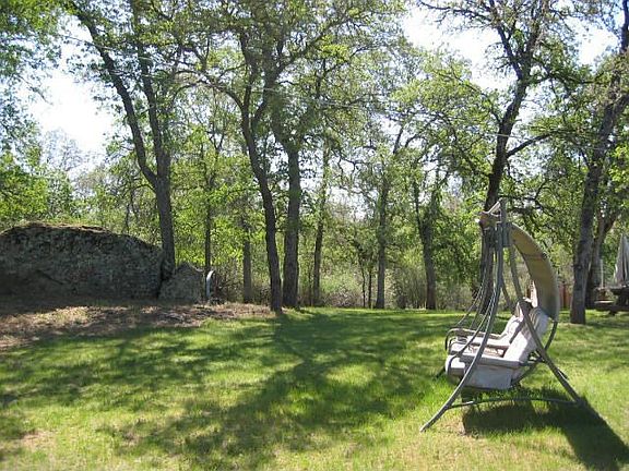 Large shaded lawn area perfect for entertaining guests