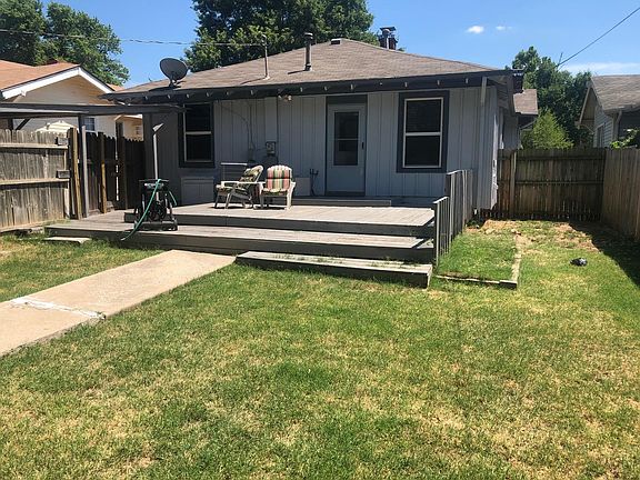 Large patio, and fenced backyard.