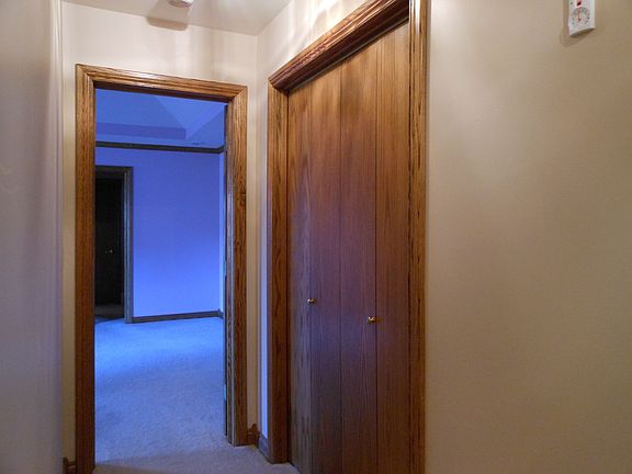 hall linen storage closet, doors closed