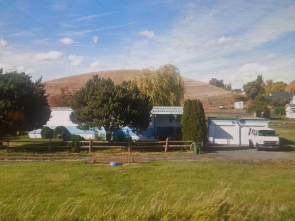 Double car garage and large yard