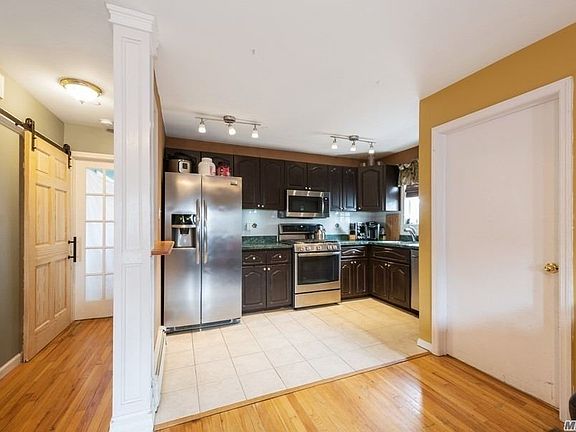 5th image of 99-54 1st St