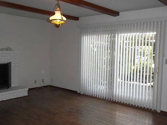 Family room, wood burning fireplace, sliding door to the backyard