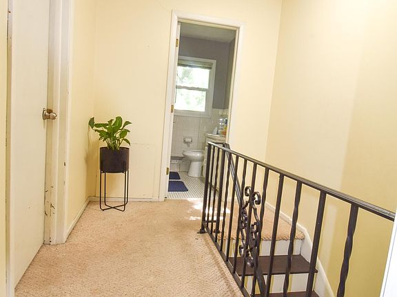 Upstairs hallway to bedrooms and bathroom