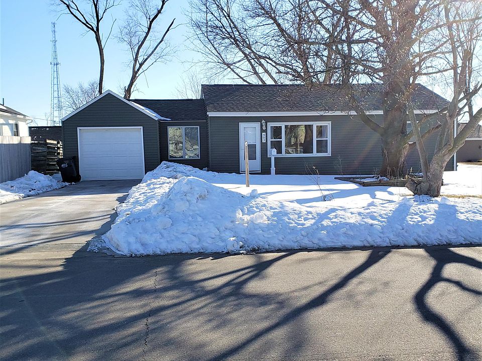 Front of house with gorgeous magnolia tree that blooms in spring