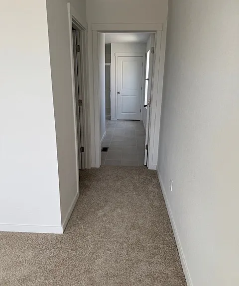Walkway to master bath and walkin closet in Master bedroom