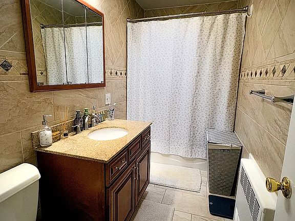 4th image of 75-12 Juniper Valley Rd #2