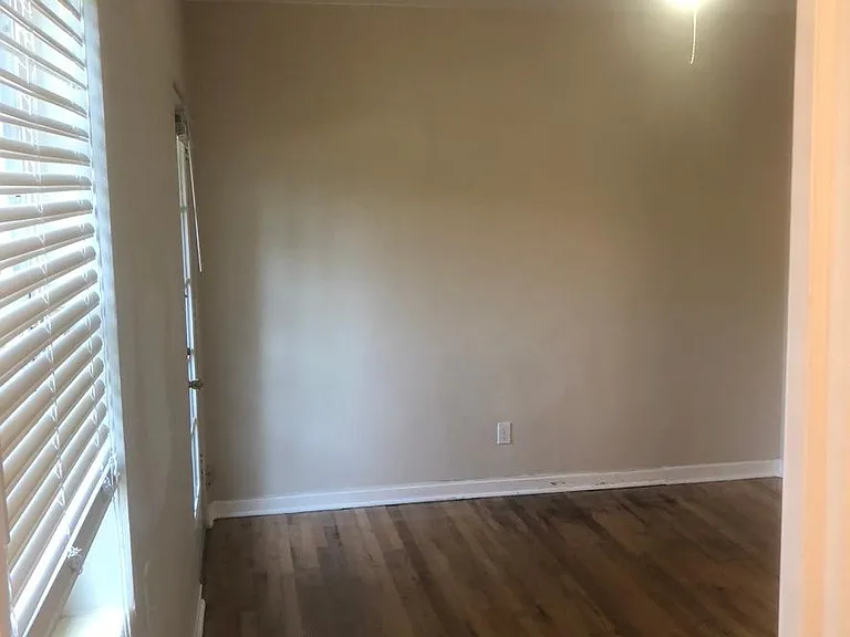 2nd Bedroom with door leading to Back Yard ( On Left )