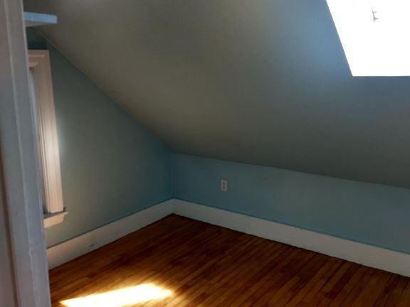 Bedroom with skylight