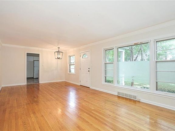 Great room with beautiful hardwood floors.