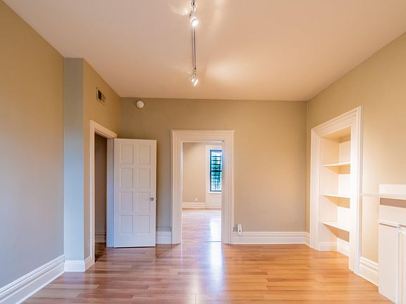 bedroom with built-in bookcase