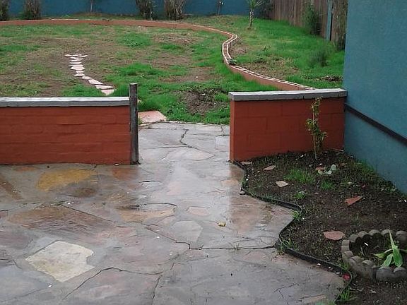 Stone patio, fenced yard