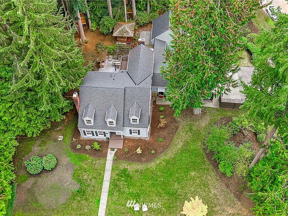 Resting on a level and very private ¾ acre lot.